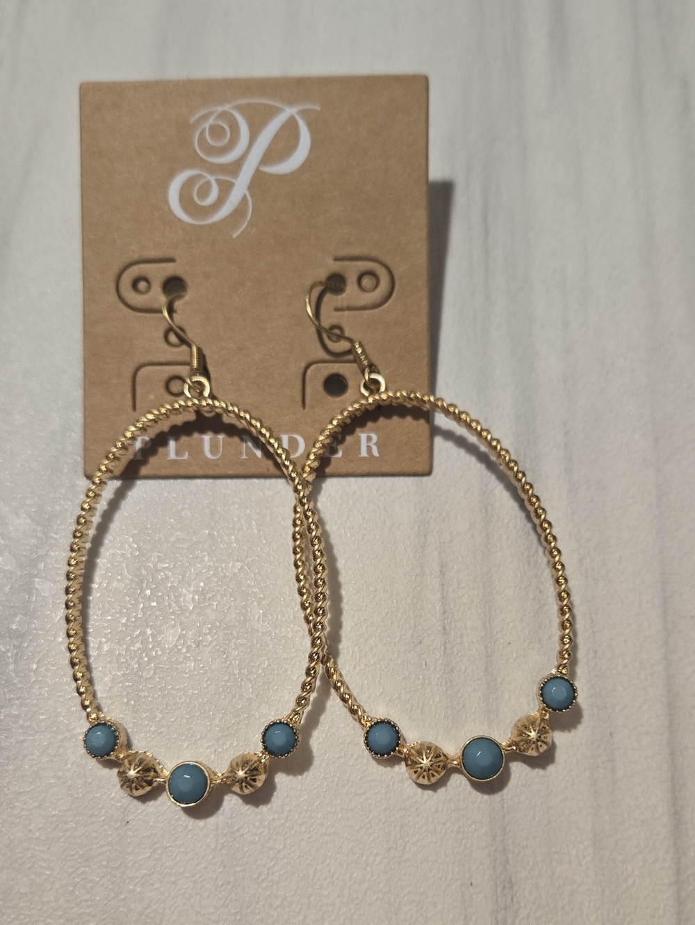 Plunder Gold-Tone Oval Hoop Earrings with Blue Accents